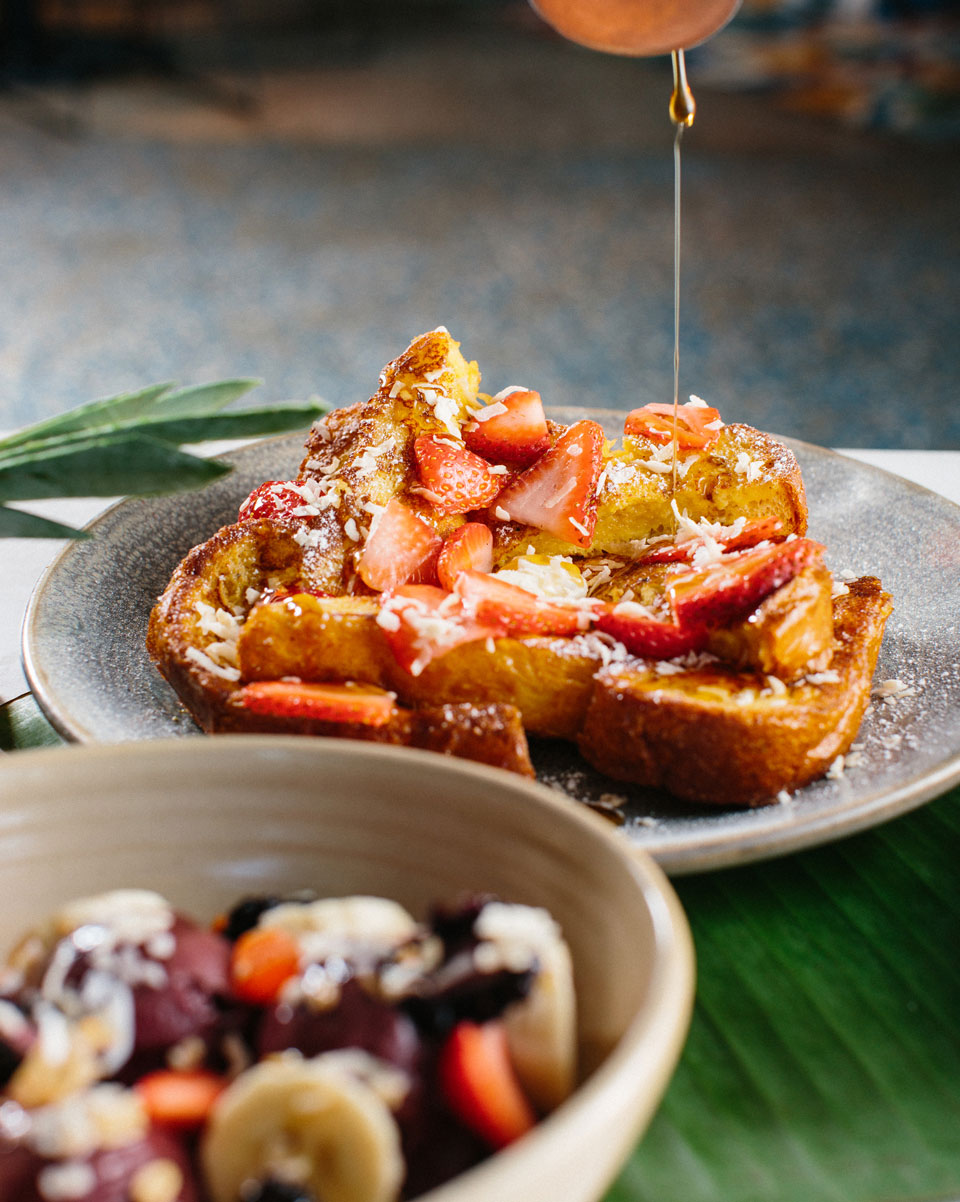 syrup dripping on fruit-covered french toast